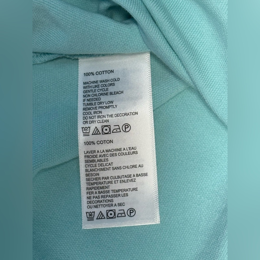 Tommy Bahama Women's Light Blue Sleeveless Pique
Polo Shirt with Floral Trim - Picture 6 of 10